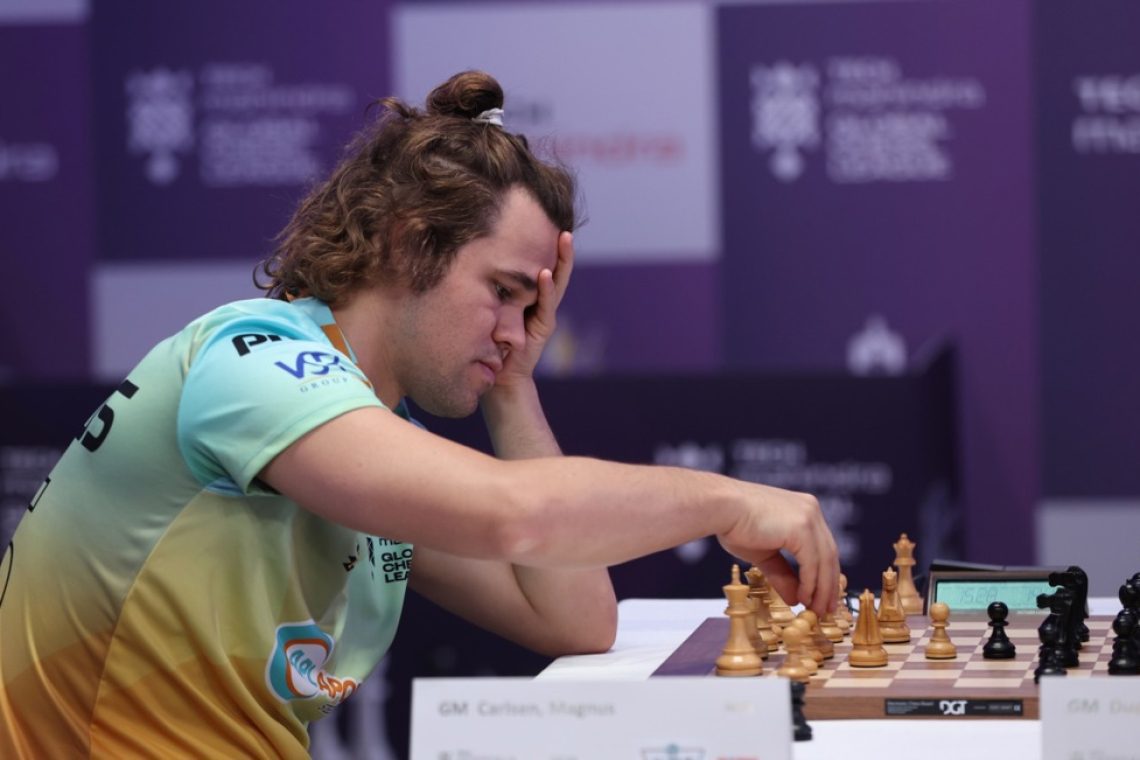 Carlsen do tretje zmage v finalu šahovskih prvakov